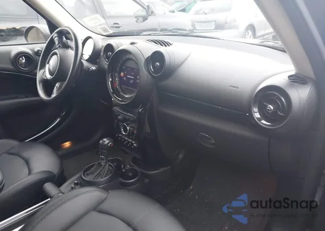 2015 Mini Countryman Cooper S z USA, uszkodzony, nr VIN WMWZC5C5XFWP47658